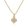 Collar Flor Dorada con Cristales Transparentes