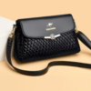 CARTERA KAIDIFEINIROO NEGRA ACOLCHADA CON SOLAPA