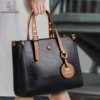 CARTERA KAIDIFEINIROO NEGRA CON ASAS MARRON