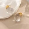 AROS DORADOS GOTA CON DETALLE BLANCO