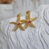 AROS DORADOS ESTRELLA DE MAR CON DETALLE ROSADO